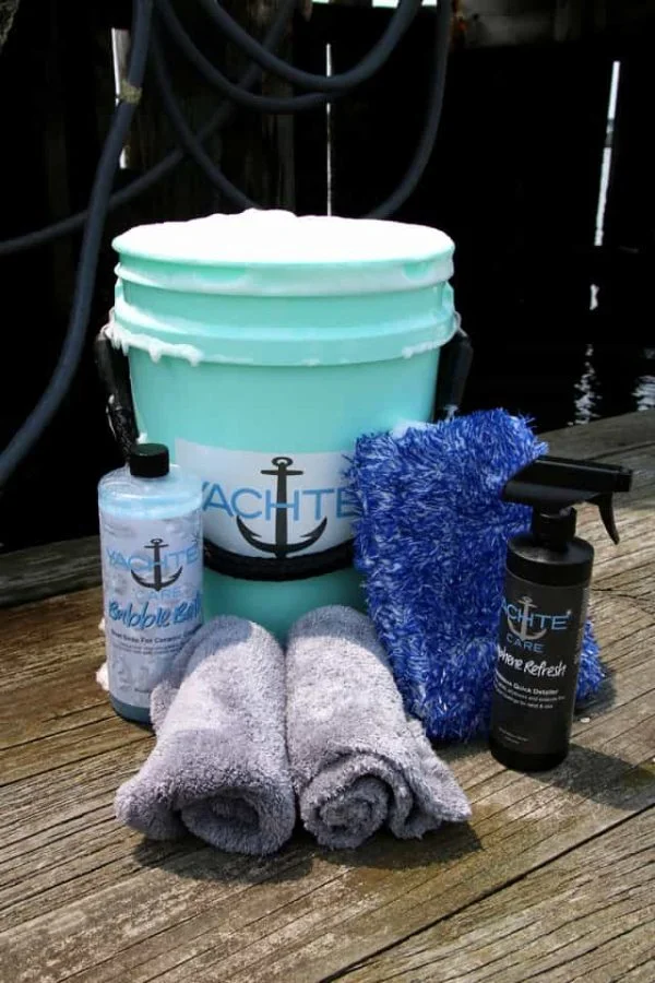 Complete boat washing kit includes 5 gallon rope handle bucket, wash pad drying aid and drying towels.